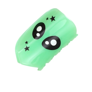 Green acetate hair claw clip with large cartoon eyes and black star patterns on white background