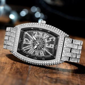 Luxury silver tonneau watch with iced out crystals and black compass dial for men