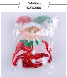 Christmas sequin elf plush doll packed in a clear OPP bag for protective display