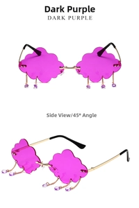 Détail de lunettes nuage sans monture violet foncé avec chaînes dorées et gouttes de cristal