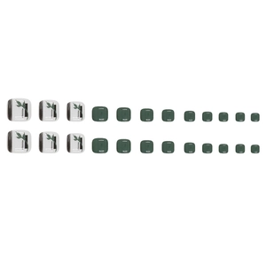 Glossy dark green and white foot nail set with leaf patterns and feminism text