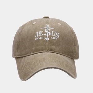 Detail of Jesus Saved My Life embroidery on washed khaki cotton baseball cap