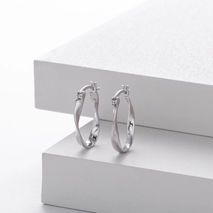 Minimalist 925 sterling silver Mobius wave hoop earrings with polished twisted geometry