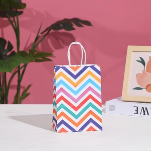 Colorful chevron paper gift bag with white twisted handles for parties and retail