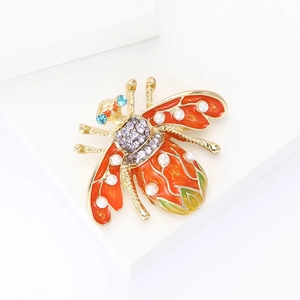 Exquisite gold alloy bee brooch with orange enamel wings and purple crystal inlay