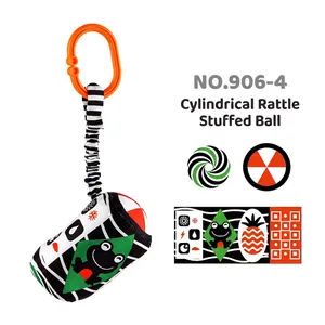 Detail of baby crib rattle toy with high-contrast black and white patterns for visual development