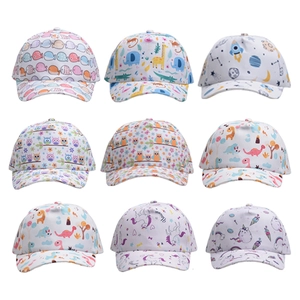 Various children's baseball caps with dinosaur and unicorn prints in a 3x3 grid display