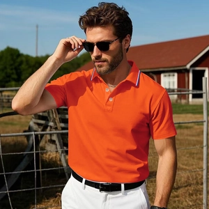 Close-up of orange short sleeve Polo shirt with striped collar and knit fabric detail