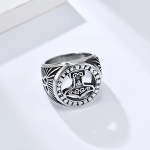 Macro shot of Viking Mjolnir ring detail in vintage oxidized stainless steel