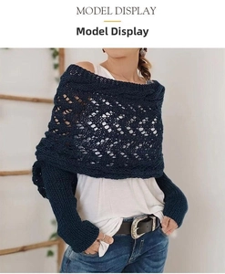 Detailed macro view of dark blue hollow-out crochet knit long sleeves on a model