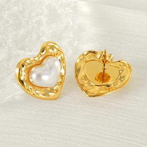Elegant gold-tone heart shaped stainless steel stud earrings with creamy pearl inlay