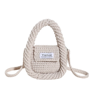 Kids knitted shoulder bag in creamy white with woven texture and top handle strap