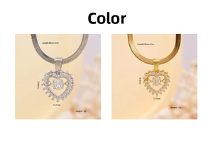 Detail of copper heart pendant necklaces in gold and silver with shimmering cubic zirconia