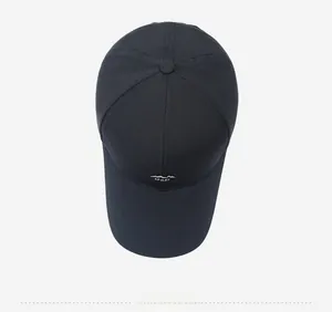 Top-down view of a navy baseball cap with white mountain logo and sport graphic