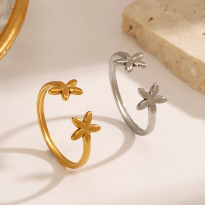 Adjustable minimalist flower rings in polished 18K gold and silver stainless steel