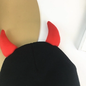 Black knit beanie with red devil horns for hip-hop winter warmth and stylish streetwear