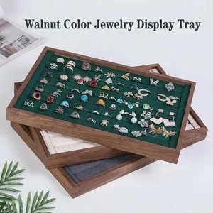 Set of walnut wood jewelry display trays with velvet lining for rings and necklaces
