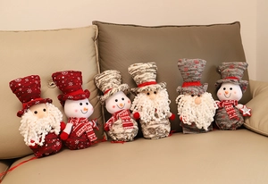 Set of six Christmas gift bags featuring Santa Claus and snowman dolls in festive red and grey