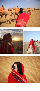 Detail of red ethnic shawl with colorful patterns against a desert sunset with camels