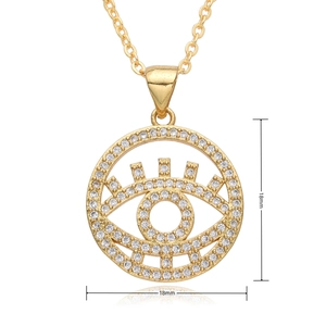 Macro detail of golden Evil Eye pendant with white zircons showing 18mm diameter