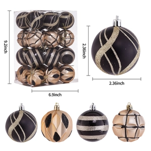 Detail of 24 black and gold Christmas balls in various patterns with size dimensions