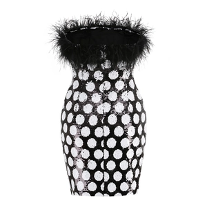 Polka dot sequin bodycon dress with black ostrich feather trim and open back design