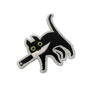 Funny embroidered black cat tactical patch with knife, featuring yellow eyes and white edges