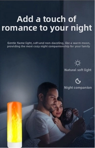 Detail of LED flame lamp with soft warm glow creating a cozy bedroom atmosphere