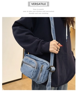 Close-up of light blue denim crossbody bag with adjustable strap worn by a model
