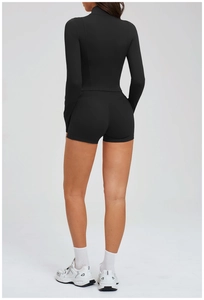 Rear view of black high-waisted fitness shorts with V-seam stitching for butt lifting effect