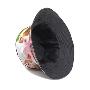 Detailed view of bucket hat with realistic dog print and black interior lining
