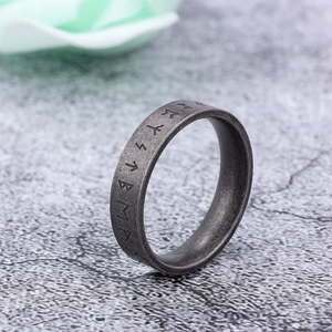 Vintage oxidized stainless steel Viking rune ring in an antique silver finish for men