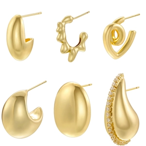 Detail shot of six 18K gold plated vintage earring styles with water drop and CZ accents