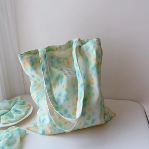 Fresh mint green watercolor tie-dye canvas tote bag with matching scrunchie accessory