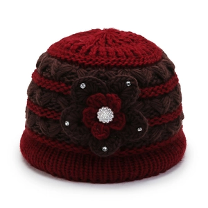 Warm and elegant burgundy knitted winter hat for elderly women with floral accents
