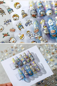 Detailed 3D embossed duck nail art stickers applied on purple and blue glitter nails