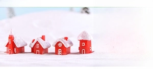 Detailed resin miniature red Christmas houses with snow effects and fine textures