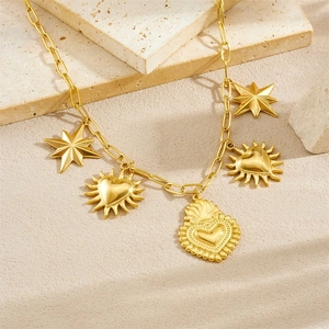 Gold stainless steel paperclip necklace with sacred heart, sun and star charms