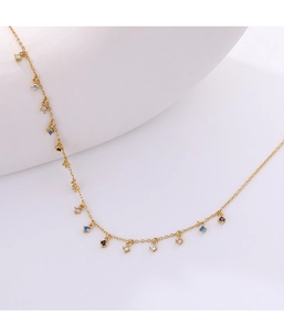 Macro shot of 925 silver gold chain necklace with colorful zircon stone pendants