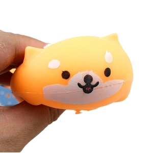 Squeezable Shiba Inu stress relief toy made of soft TPR material shown in orange