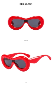 Detailed front and side views of chunky Y2K red frames with black lenses sunglasses