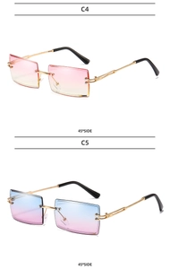 Detail view of rimless square sunglasses with gradient lenses and gold metal temples
