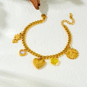Gold plated stainless steel charm bracelet with flower, heart and butterfly pendants