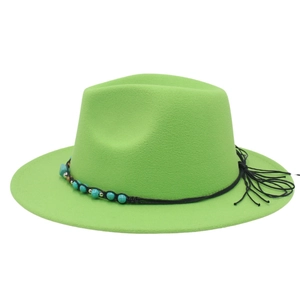 Detailed view of neon green fedora hat with turquoise beaded band and black tassel trim