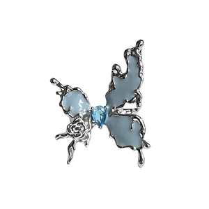 Elegant irregular butterfly open ring with blue gemstones and silver rose detail