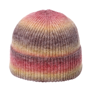 Rainbow gradient rib-knit beanie hat for women featuring a warm pink and yellow tie-dye design