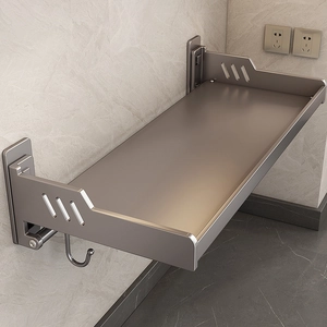 Gun grey wall-mounted kitchen rack with folding design and hooks on marble wall