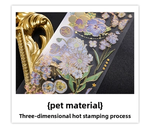 Detail of vintage floral PET stickers with 3D gold stamping and butterfly patterns