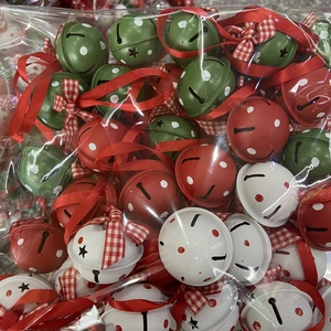 Colorful Christmas iron bells with polka dots and plaid bows for holiday tree decoration