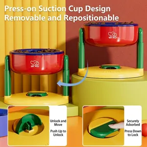 Adjustable pet bowl with vacuum suction cup base for dogs and cats in red and yellow